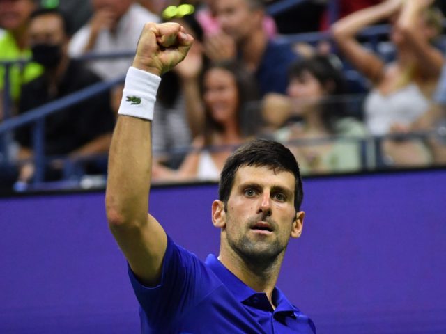 Serbia's Novak Djokovic celebrates after winning a point against USA's Jenson Brooksby during their 2021 US Open Tennis tournament men's singles fourth round match at the USTA Billie Jean King National Tennis Center in New York, on September 6, 2021. (Photo by Ed JONES / AFP) (Photo by ED JONES/AFP …