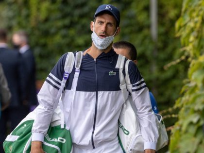 Serbia's Novak Djokovic arrives at the Aorangi Practice Courts on the ninth day of the 2021 Wimbledon Championships at The All England Tennis Club in Wimbledon, southwest London, on July 7, 2021. - RESTRICTED TO EDITORIAL USE (Photo by AELTC/David Gray / POOL / AFP) / RESTRICTED TO EDITORIAL USE …