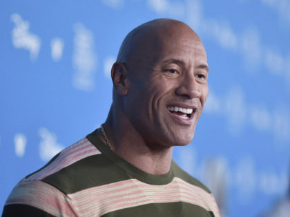 Dwayne Johnson attends the Go Behind the Scenes with the Walt Disney Studios press line at the 2019 D23 Expo on Saturday, Aug. 24, 2019, in Anaheim, Calif. (Photo by Richard Shotwell/Invision/AP)
