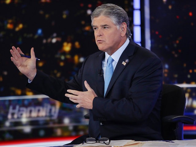 FILE - In this Aug. 7, 2019, photo, Fox News host Sean Hannity speaks during a taping of h