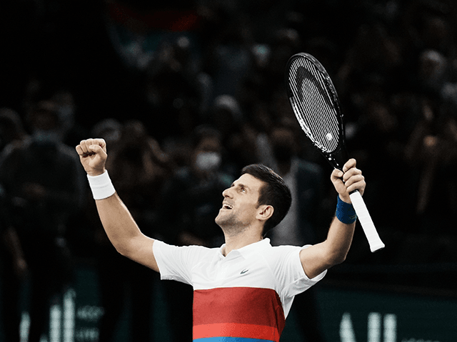 Serbia's Novak Djokovic celebrates defeating Russia's Daniil Medvedev during the final mat