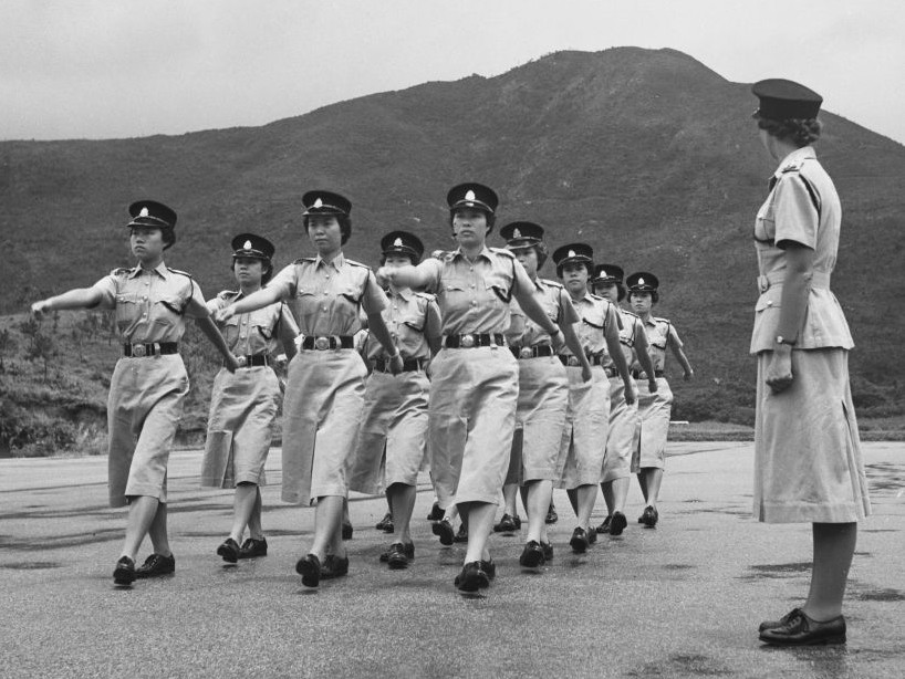 ub-Inspector Margaret Patrick (right) oversees the training of fifty-five female recruits to the Hong Kong Police Force, at the Aberdeen Police Training School, Hong Kong, January 1957. (Photo by Keystone Features/Hulton Archive/Getty Images)