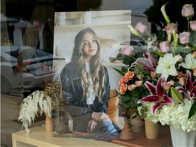 LOS ANGELES, CALIFORNIA - JANUARY 17: Flowers are placed outside Croft House furniture store in memory of graduate student Brianna Kupfer. Kupfer was stabbed to death by an unknown assailant while working in the store on Thursday January 13th in Los Angeles. (Photo by Emma McIntyre/Getty Images)