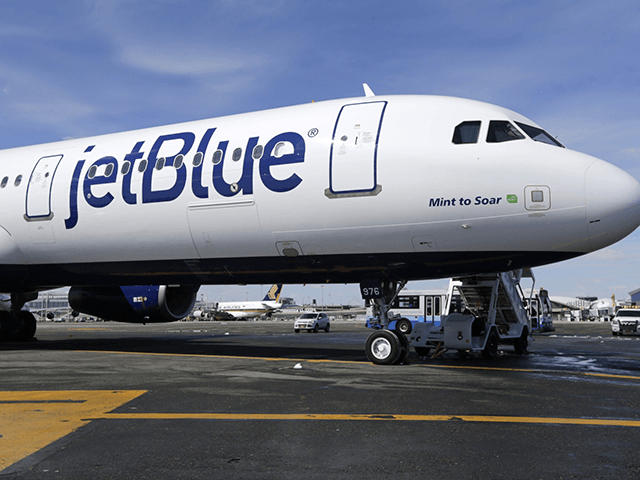 This March 16, 2017, file photo, shows a JetBlue airplane at John F. Kennedy International