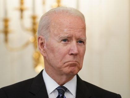 US President Joe Biden llooks on as Attorney General Merrick Garland (off frame) speaks about crime prevention, in the State Dining Room of the White House in Washington, DC on June 23, 2021. - President Biden unveiled new measures Wednesday to tackle gun violence against a backdrop of surging crime …