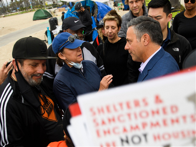 Los Angeles City Council member and mayoral candidate Joe Buscaino speaks with supporters, before a person was detained for a knife, during an event to announce his 
