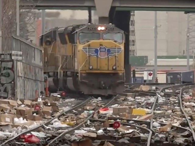 WATCH: Thousands of Stolen Packages Cover Downtown LA Train Tracks - Vimarsana News