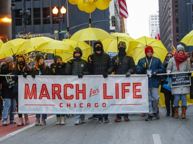 CHICAGO, IL - JANUARY 08: Pro-life advocates walk during the March For Life on January 8, 2022 in Chicago, Illinois. The rally and march were a part of a three-day annual public event. (Photo by Kamil Krzaczynski/Getty Images)
