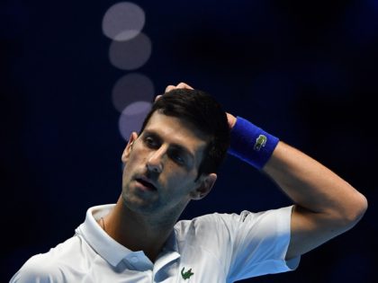 Serbia's Novak Djokovic reacts during his semi-final match of the ATP Finals against Germany's Alexander Zverev at the Pala Alpitour venue in Turin on November 20, 2021. (Photo by Marco BERTORELLO / AFP) (Photo by MARCO BERTORELLO/AFP via Getty Images)