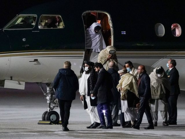 TOPSHOT - Taliban representatives arrive in Gardermoen, Norway, on January 22, 2022, for t