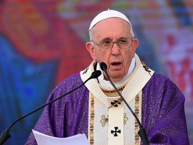 Pope Francis gives the homily (sermon) during a mass at the Franso Hariri Stadium in Arbil
