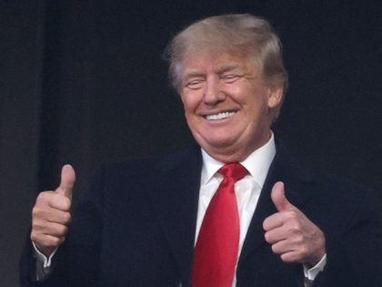 ATLANTA, GEORGIA - OCTOBER 30: Former president of the United States Donald Trump gives a thumbs up prior to Game Four of the World Series between the Houston Astros and the Atlanta Braves at Truist Park on October 30, 2021, in Atlanta, Georgia.