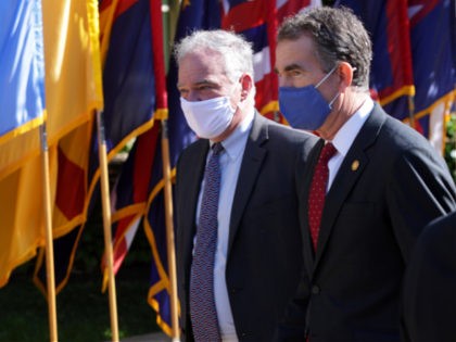 ARLINGTON, VIRGINIA - SEPTEMBER 10: U.S. Sen. Tim Kaine (D-VA) (L) and Virginia Governor Ralph Northam (R) arrive at a September 11 observance ceremony for Pentagon employees at the Pentagon September 10, 2021 in Arlington, Virginia. The Department of Defense held the event to mark the 20th anniversary of the …