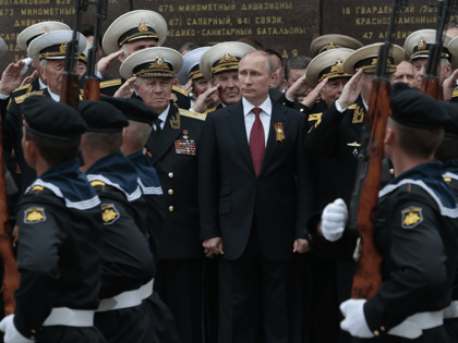Russian President Vladimir Putin attends a parade marking the Victory Day in Sevastopol, Crimea, on May 9, 2014. Russia's present demands are based on Putin's purported long sense of grievance and his rejection of Ukraine and Belarus as truly separate, sovereign countries but rather as part of a Russian linguistic …