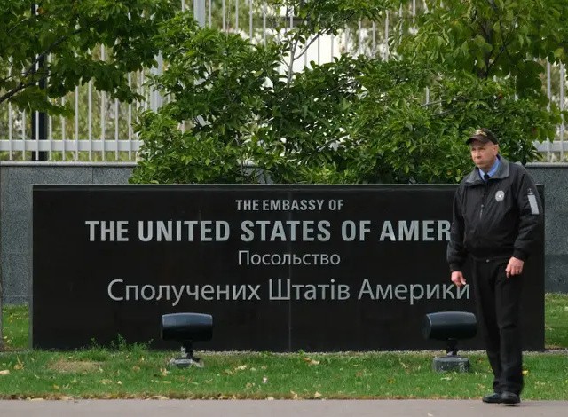 KIEV, UKRAINE - OCTOBER 01: A security guard stands outside the embassy of the United States of America on October 01, 2019 in Kiev, Ukraine. Ukraine has found itself at the core of a political storm in U.S. politics since the release of a whistleblower's complaint suggesting U.S. President Donald Trump, at the expense of U.S. foreign policy, pressured Ukraine to investigate Trump's rival, Joe Biden, and Biden's son, Hunter. (Photo by Sean Gallup/Getty Images)