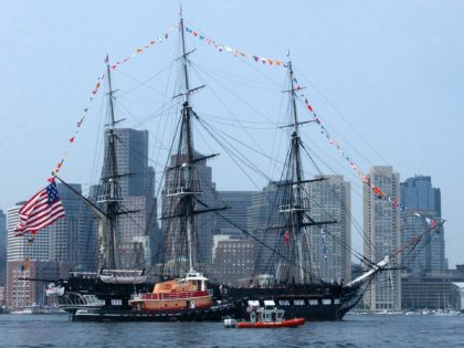 BOSTON - JUNE 11: In this handout photo provided by the U.S. Coast Guard, multiple Coast Guard resources escort the USS Constitution, Boston's beloved "Old Iron Sides," June 11, 2005 in Boston, Massachusetts. The boat went out to an island in south Boston where the USS Constitution fired its 21 …