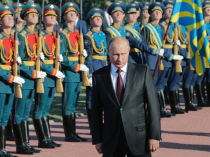 Russian President Vladimir Putin reviews the guard of honour during a memorial ceremony, to mark the 75th anniversary of the battle of Kursk, in Kursk, southern of Moscow, on August 23, 2018. - Putin attends a ceremony marking the 75th anniversary of the battle of Kursk in which the Soviet …