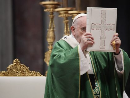 Pope Francis holds a Holy Book of Prayers as he celebrates a mass on the occasion of the Sunday of the Word of God on January 23, 2022 at St. Peter's basilica in The Vatican. (Photo by Filippo MONTEFORTE / AFP) (Photo by FILIPPO MONTEFORTE/AFP via Getty Images)