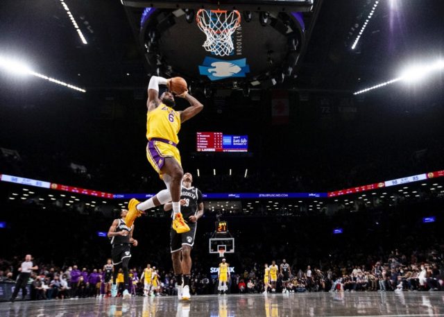 Los Angeles Lakers' LeBron James dunks against the Brooklyn Nets at Barclays Center in New