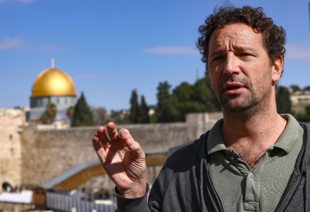French historian Vincent Lemire speaks during a interview near the Western Wall in Jerusa