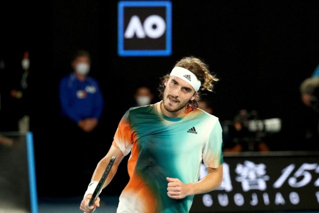 Greece's Stefanos Tsitsipas reacts after a point against Russia's Daniil Medvedev