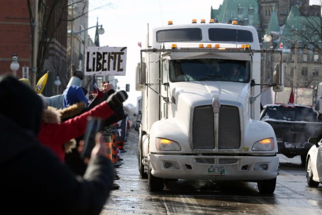 Supporters of the Canadian truckers' protest against Covid-19 vaccine mandates pulled in f