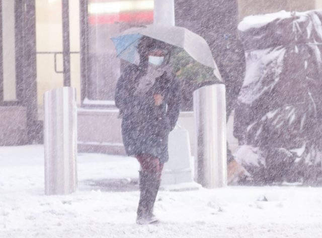 Winter snowstorm hits Northeast, causing power outages, canceled flights