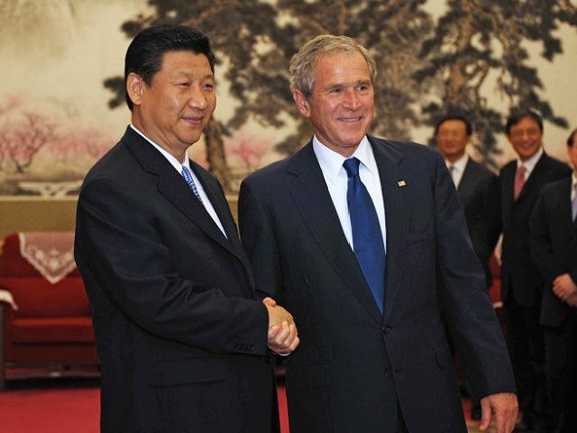 US President George W. Bush shakes hands with Chinese Vice President Xi Jinping (L) during a meeting in the Zhongnanhai compound in Beijing on August 10, 2008. Bush, who attended the opening ceremony of the 2008 Beijing Olympic Games on August 8, attended a church service in Beijing on August …
