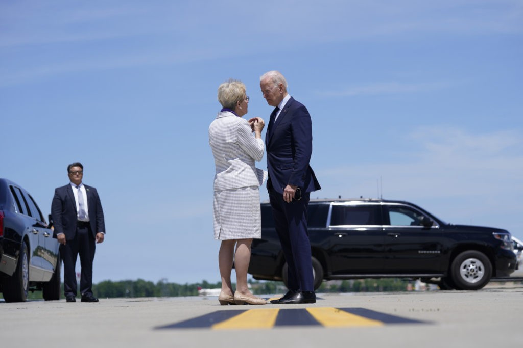 President Joe Biden speaks with Rep. Marcy Kaptur, D-Ohio, as he arrives at Cleveland Hopkins International Airport, Thursday, May 27, 2021, in Cleveland. (AP Photo/Evan Vucci)