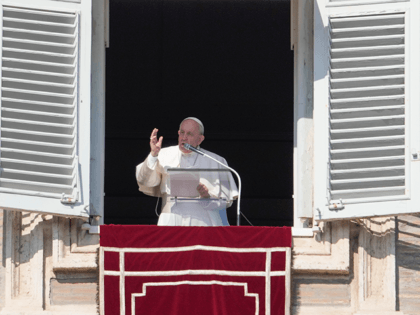 Pope Francis delivers the Angelus noon prayer from his studio window overlooking St. Peter's Square at the Vatican, Sunday, Feb. 6, 2022. (AP Photo/Gregorio Borgia)