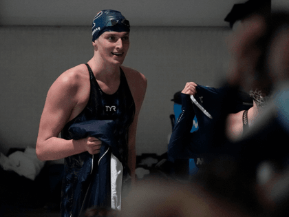 Pennsylvania's Lia Thomas smiles after setting a meet and pool record in the 200-yard freestyle final at the Ivy League women's swimming and diving championships at Harvard University, Friday, Feb. 18, 2022, in Cambridge, Mass. Thomas, who is transitioning to female, is swimming for the Penn women's team. (AP Photo/Mary …
