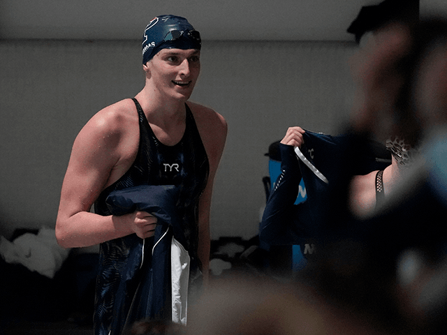 Pennsylvania's Lia Thomas smiles after setting a meet and pool record in the 200-yard free