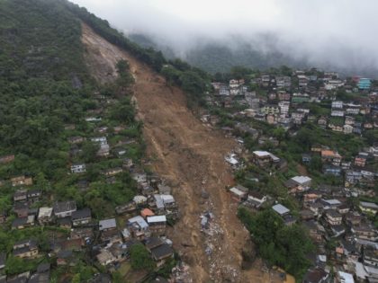 An aerial view shows neighborhood affected by landslides in Petropolis, Brazil, Wednesday,