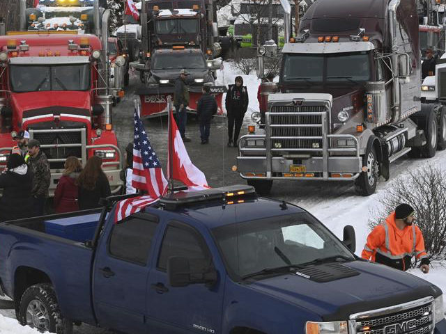 Alaskan Truck Drivers gather to form the 'Alaska Freedom Convoy' in support of Canadian Truck drivers protesting coronavirus mandates. (Bill Roth/Anchorage Daily News via AP)