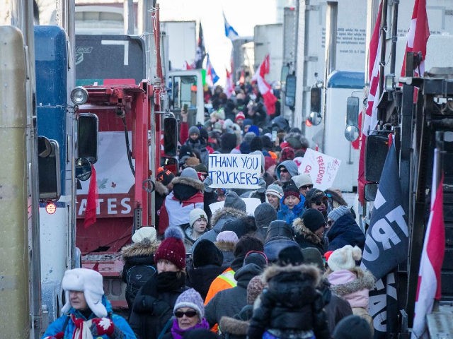 Supporters arrive at Parliament Hill for the Freedom Truck Convoy to protest against Covid