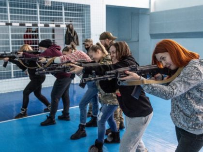 OBUKHIV, UKRAINE - FEBRUARY 06: Civilians participate in a beginners’ combat and survival training course run by instructors from the Ukraine Territorial Defence units at a school in a Obukhiv on February 06, 2022 in Kyiv, Ukraine. Across Ukraine, civilians are participating in such groups to receive basic combat, medical …