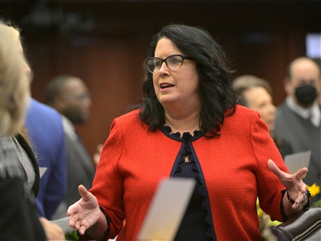 Florida Sen. Kelli Stargel talks with guests during a legislative session, Tuesday, Jan. 11, 2022, in Tallahassee, Fla. (AP Photo/Phelan M. Ebenhack)
