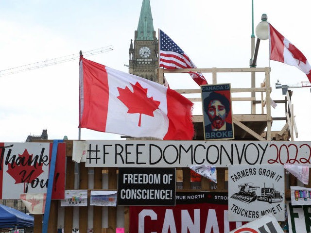 A truck with banners is seen parked in front of Parliament of Canada as demonstrators continue to protest the vaccine mandates implemented by Prime Minister Justin Trudeau on February 10, 2022 in Ottawa, Canada. (Photo by Dave Chan / AFP via Getty Images)