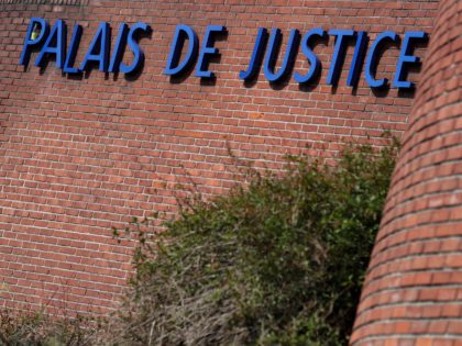 A picture taken on March 27, 2019 shows the lettering 'Palais de Justice' at the entrance to the courthouse of the Criminal Court of Bobigny near Paris. - Following a series of vigilante attacks near Paris against the Roma community, sparked by false reports of attempted kidnappings, police arrested 20 …