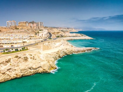 City walls on the rocky Mediterranean coast in Melilla, Spanish province in Morocco.