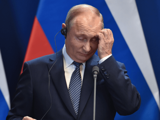 Russian President Vladimir Putin addresses a press conference with the Hungarian Prime Minister Viktor Orban at the residence of the prime minister office in Budapest on October 30, 2019. - The Russian President is on brief visit to Hungary having talks with the Hungarian prime minister. (Photo by Attila KISBENEDEK …