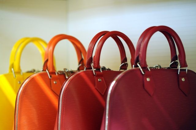 Handbags are displayed in a Louis Vuitton shop on its opening day on January 27, 2012 in R