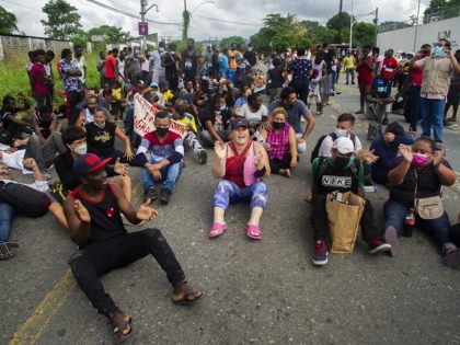 Haitian and Central American migrants protest in front of the Siglo XXI Migratory Station in Tapachula, Chiapas, Mexico, on September 15, 2021. - Some 200 migrants, mostly Haitians, marched on Wednesday from the centre of the city of Tapachula, in the southern state of Chiapas, to the National Migration Institute …