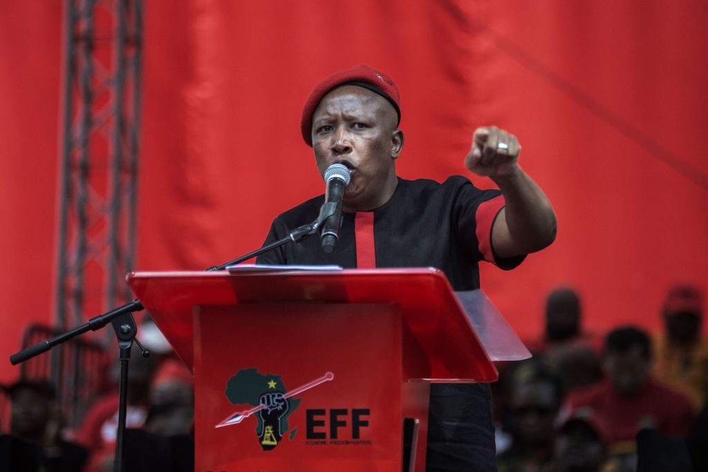 Economic Freedom Fighters (EFF) leader Julius Malema gestures as he addresses his supporters during the party's manifesto launch for the upcoming local government elections in Johannesburg, on September 26, 2021.