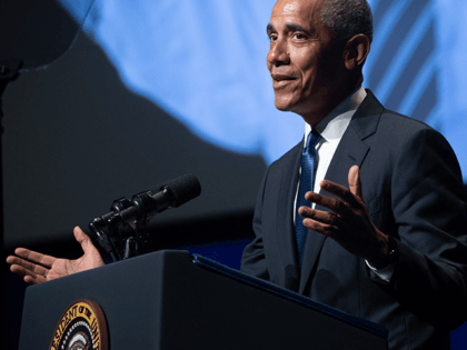 Former US President Barack Obama speaks during a memorial service for the late US Senate M