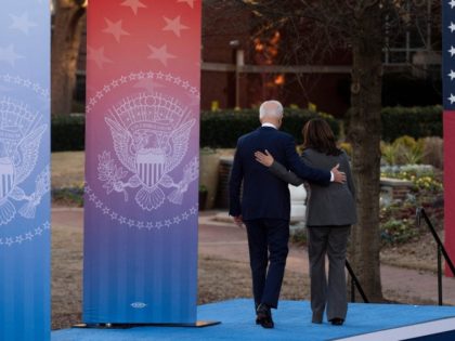 President Joe Biden (L) and Vice President Kamala Harris depart after speaking about the constitutional right to vote at the Atlanta University Center Consortium in Atlanta, Georgia on January 11, 2022.