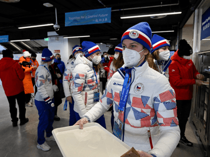 Athletes prepare to order food at a restaurant in Beijing 2022 Winter Olympic Games village in Beijing on February 1, 2022, ahead of the 2022 Beijing Winter Olympic Games. (Photo by WANG Zhao / POOL / AFP) (Photo by WANG ZHAO/POOL/AFP via Getty Images)