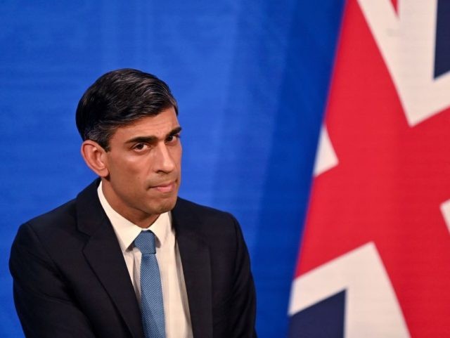 Britain's Chancellor of the Exchequer Rishi Sunak hosts a press conference in the Dow