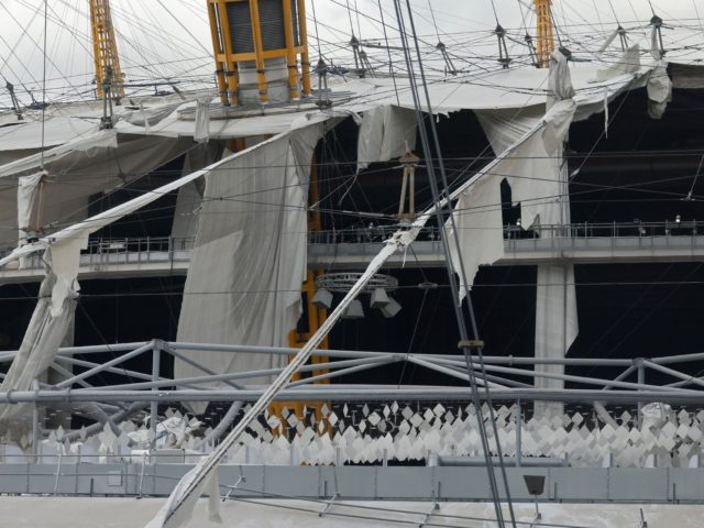 Wind-damaged sections of the roof of The O2 Arena, formerly the Millennium Dome, are pictu