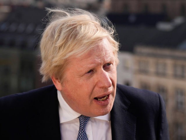 MUNICH, GERMANY - FEBRUARY 19: British Prime Minister Boris Johnson briefs the media duri